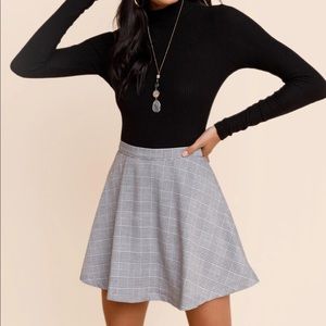 Francesca’s Plaid Mini Skater Skirt